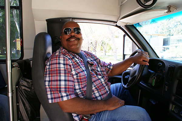 Oscar Warren has worked as a shuttle driver at Mills for the past 9 years. (Photo by Natalie Meier)